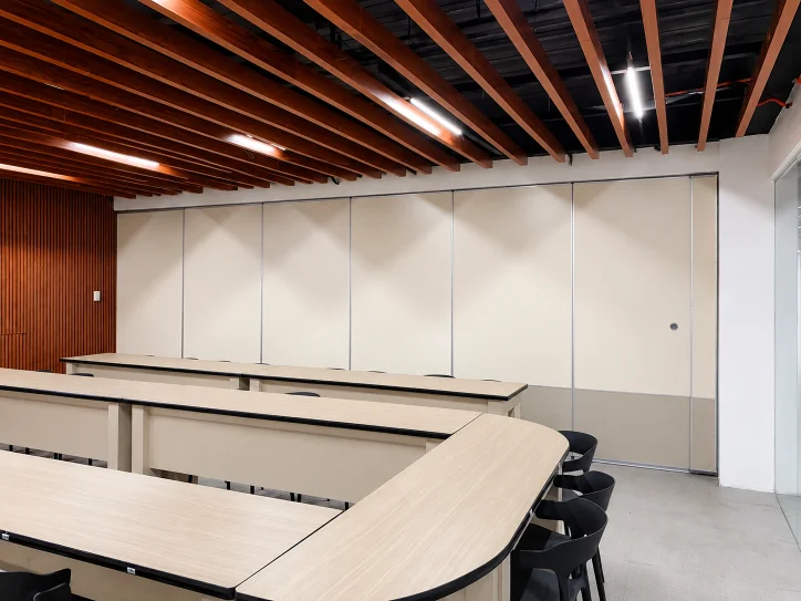A VersaWall operable partition closing across a large function hall