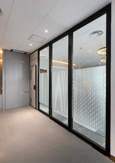 A VersaWall movable wall in a modern open-plan office