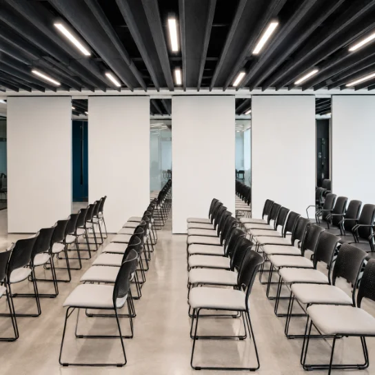 A VersaWall partition dividing a university classroom